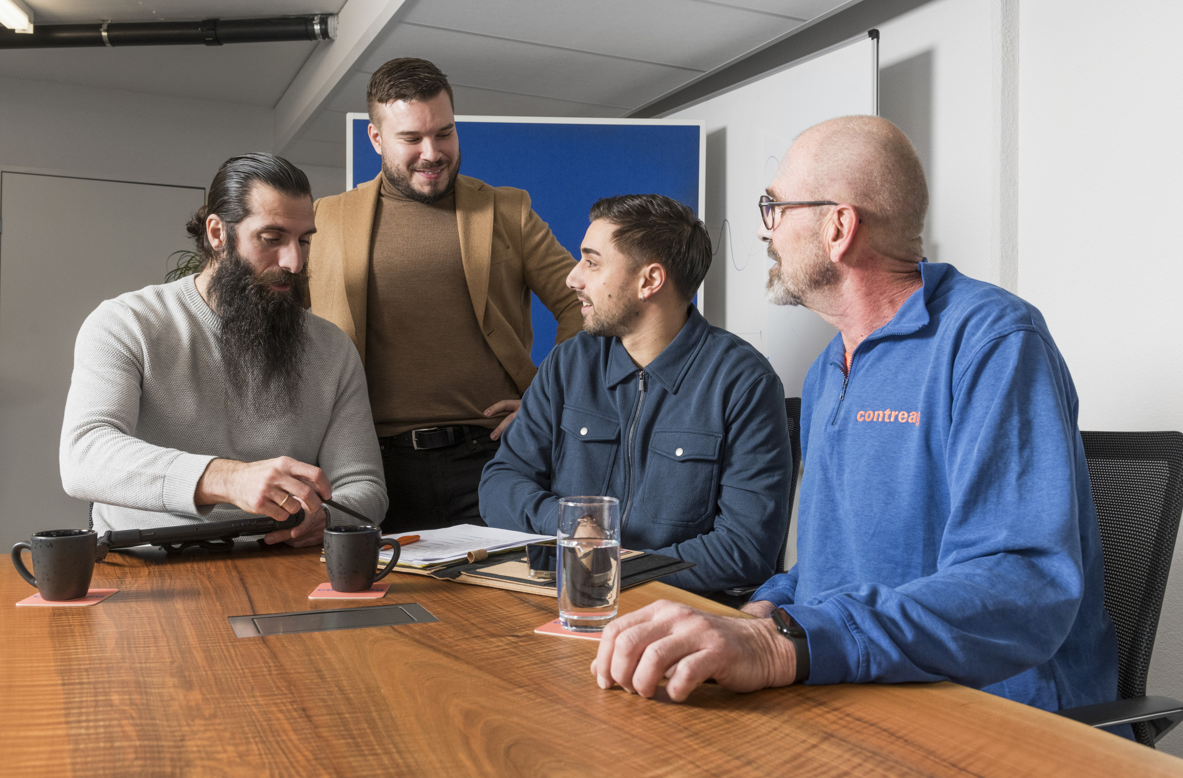 Ein Meeting der Contreag Mitarbeiter